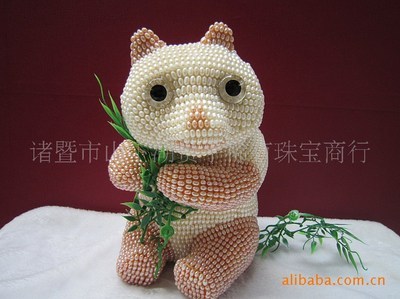 寻找熊猫之美 从诸暨山下的纯手工珍珠采选到独特玉雕杰作
